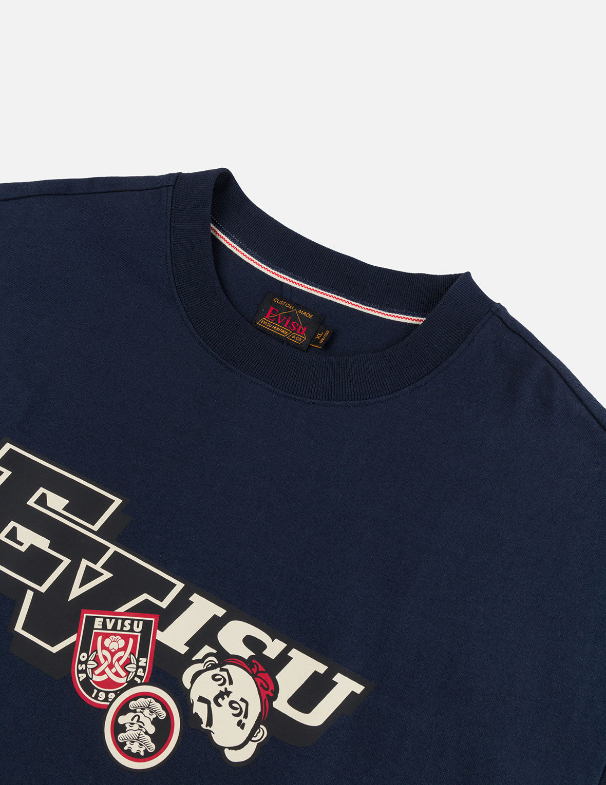 文字繪佛頭與智慧之輪標籤大M印花寬版休閒T恤