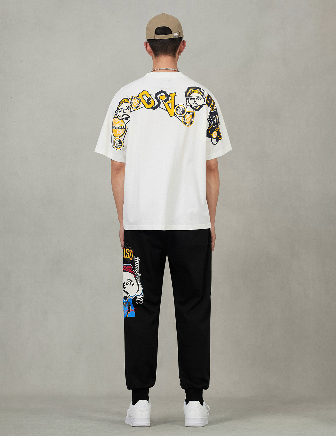 文字繪佛頭與智慧之輪標籤大M印花寬版休閒T恤