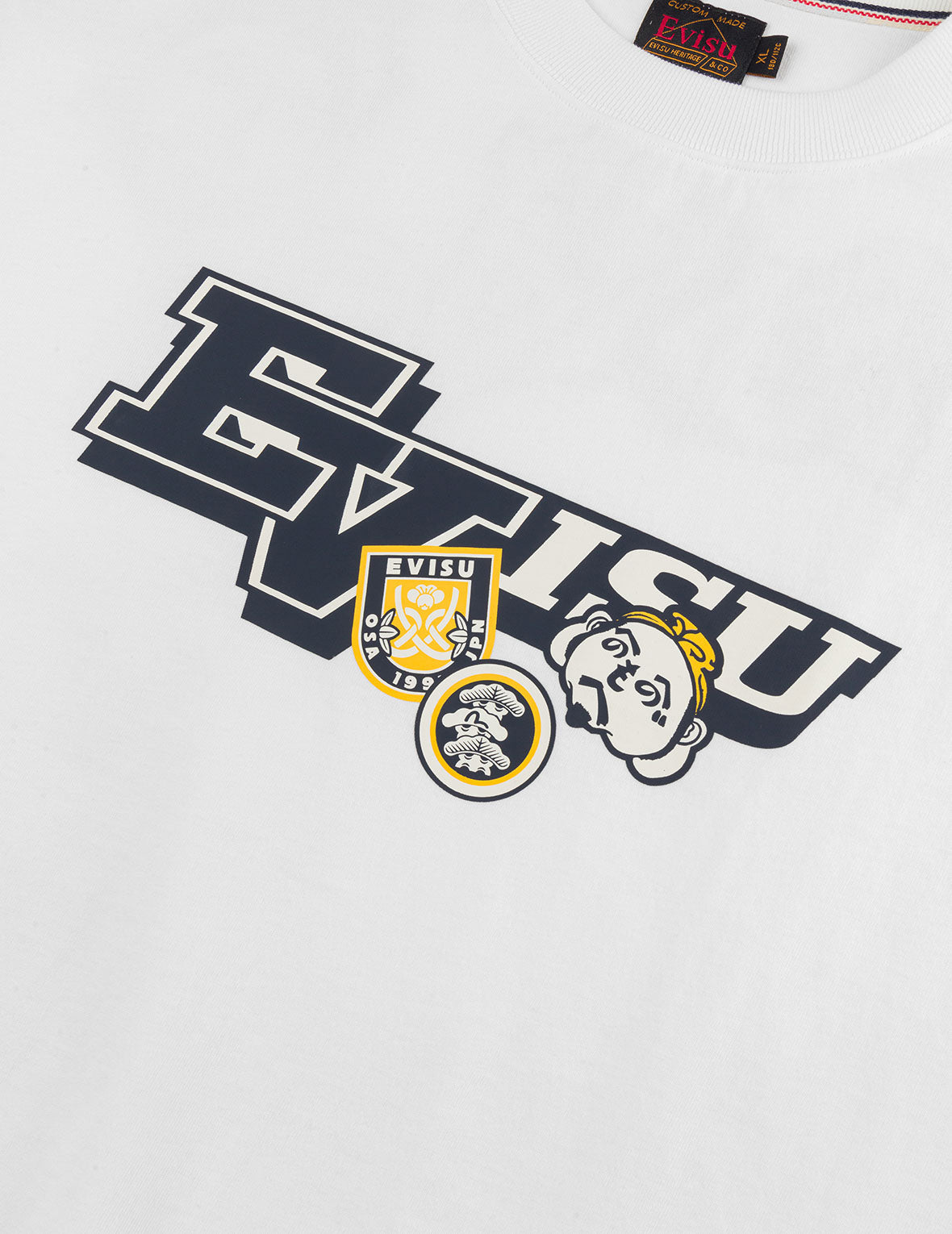 文字繪佛頭與智慧之輪標籤大M印花寬版休閒T恤