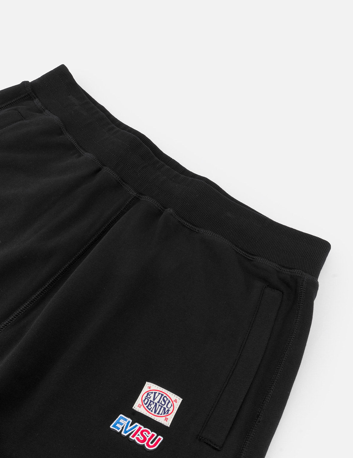 標語大M印花貼布繡口袋寬版運動褲