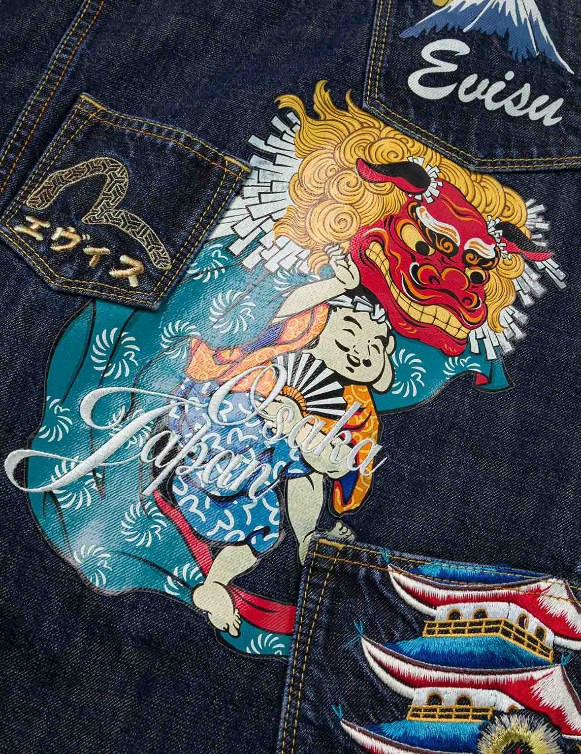 多口袋和佛頭舞獅印花寬版休閒水洗牛仔外套