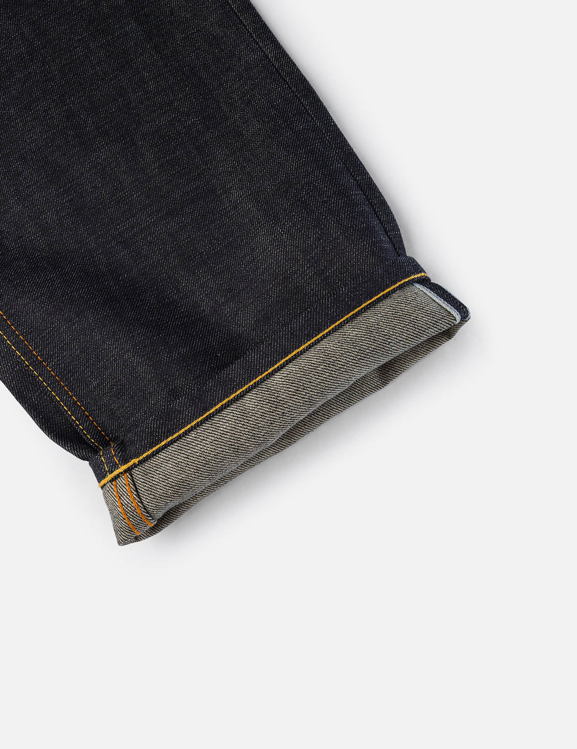 筆刷大M印花與海浪刺繡休閒牛仔褲