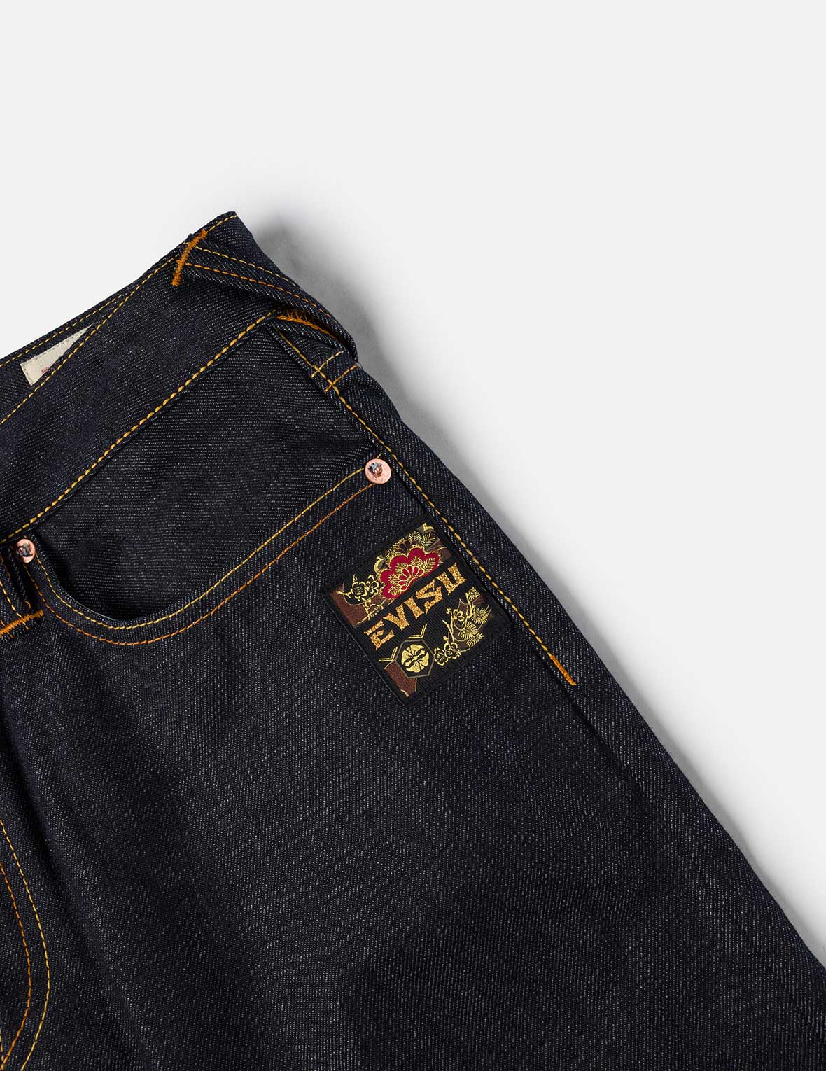 筆刷大M印花與海浪刺繡休閒牛仔褲